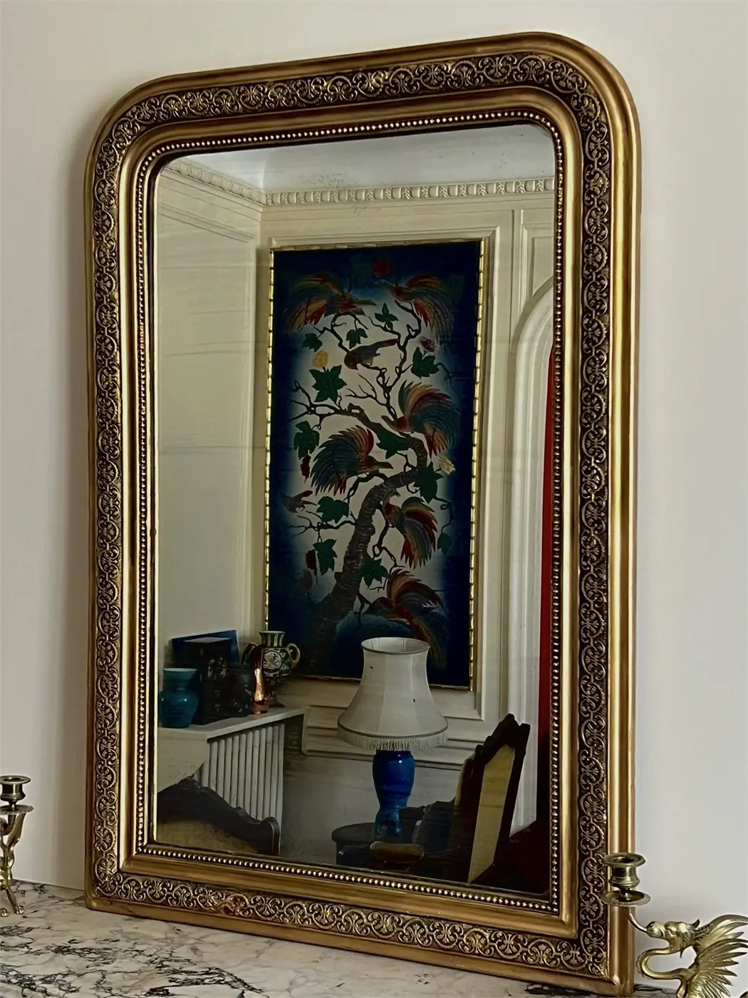 Miroir style Napoléon III doré – cadre à décor de rinceaux – 108 x 75 cm – fin XIXème – début XXème