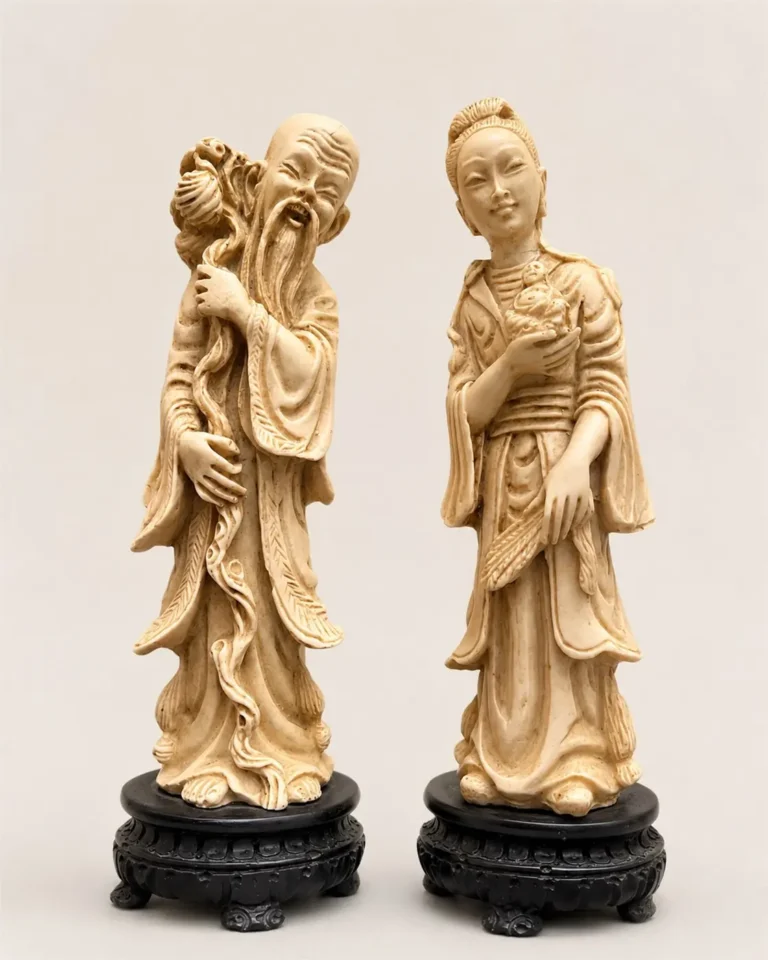 Paire de statuettes chinoises – figures de longévité et de protection